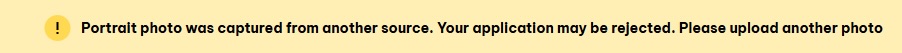 Error Message: Portrait photo was captured from another source. Your application may be rejected. Please upload another photo